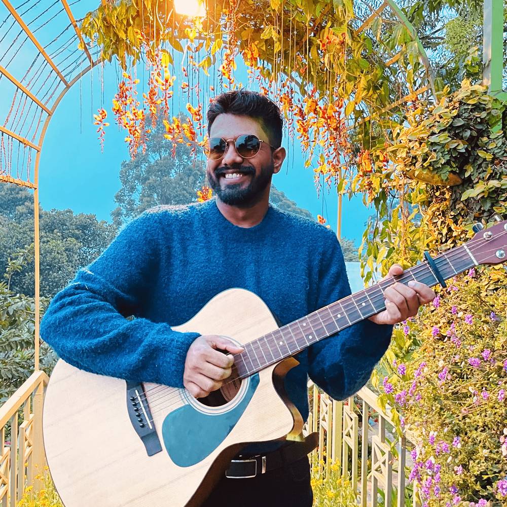 Ashwin Syam with his guitar